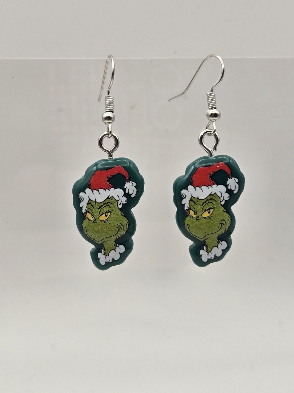Green Grinch Face Dangle Earrings with Red Hat